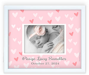 Custom personalized picture frame gift with pink painted hearts and little girl's name and date of birth.